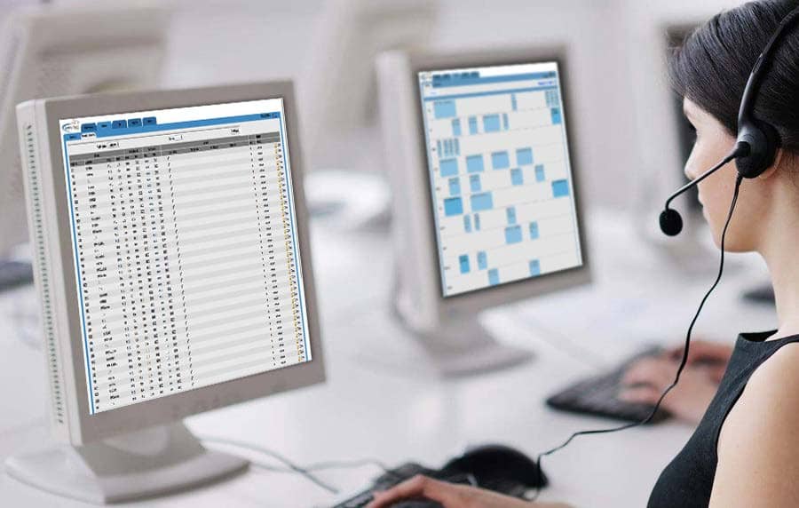 Airline operations specialist working with reservation and scheduling software